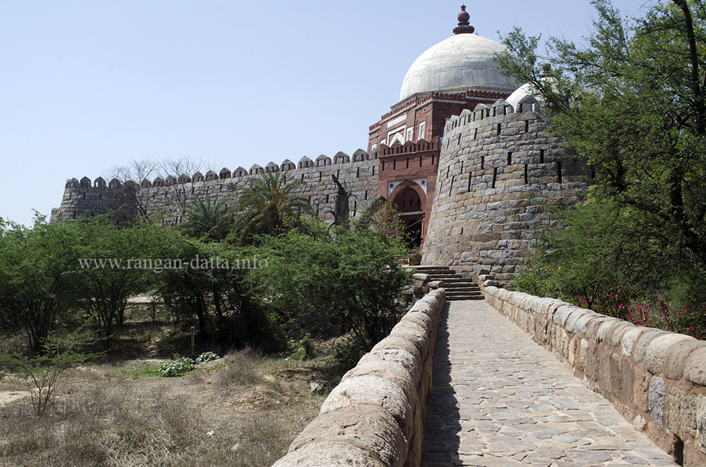 Causeway leading to the gateway of Ghiyas ud - Din Tughluq's Tomb, Delhi